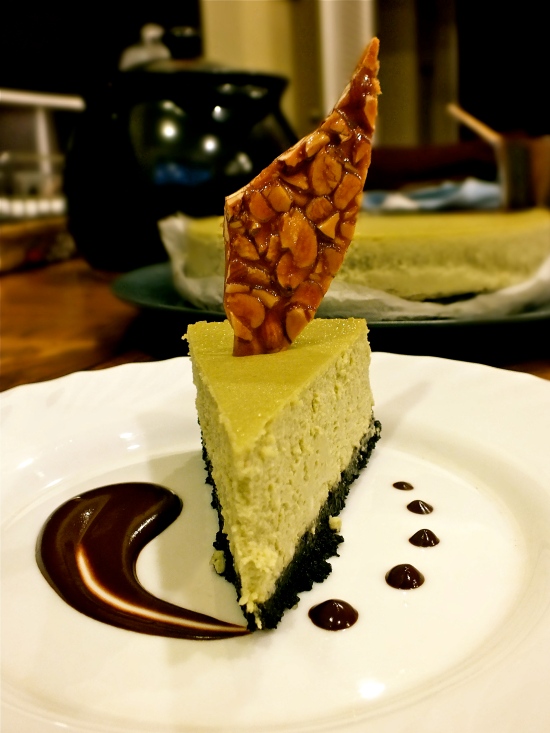 Matcha Cheesecake with Sesame Chocolate Crust, Almond Nougatine, and Milk Chocolate Ganache Glaze (August 2014)